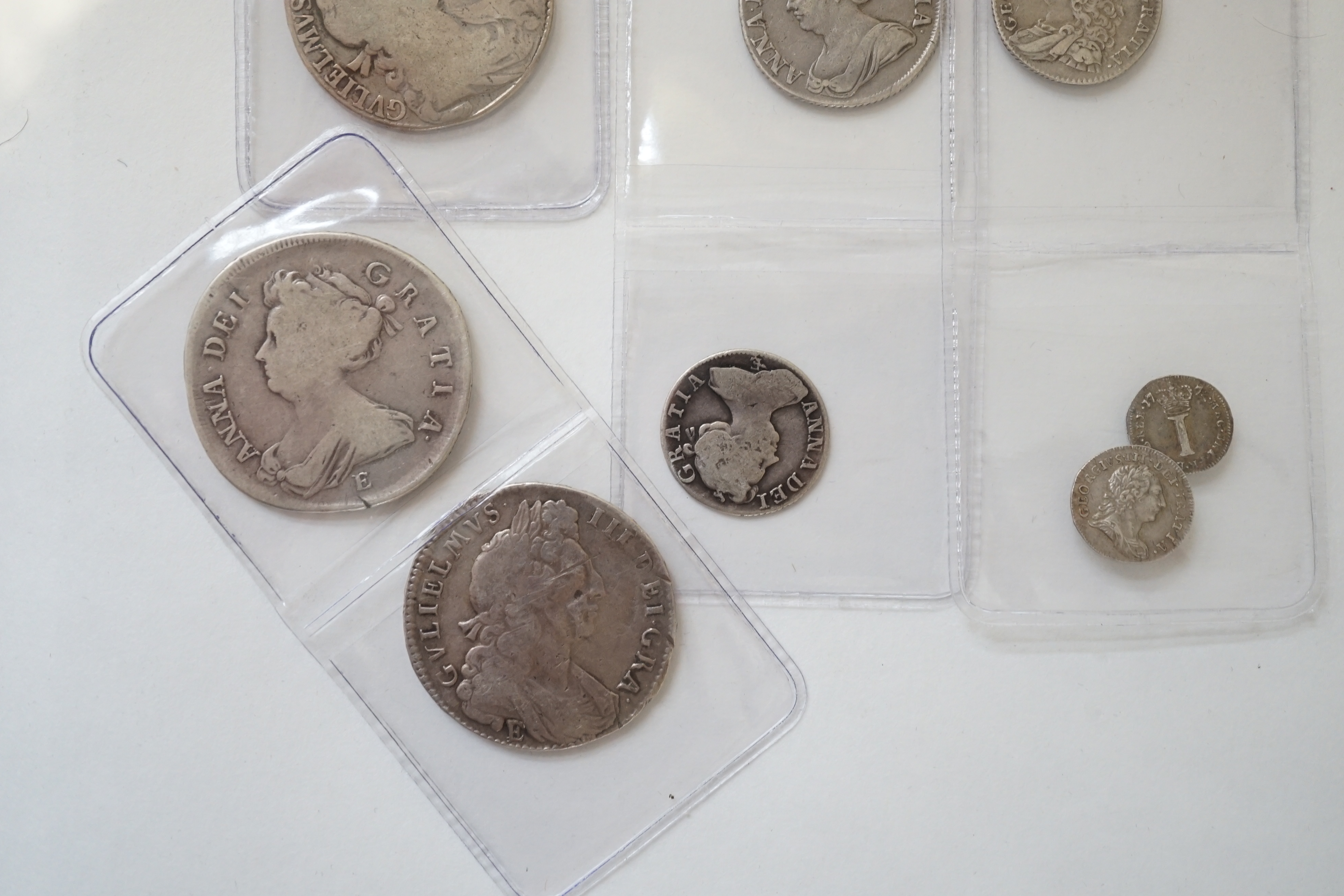 British milled silver coins, Stuart to Georgian, comprising William and Mary and halfcrown, 1689, William III halfcrown, 1697E, Anne halfcrown, 1707E, shilling, 1711, plugged hole otherwise fine, sixpence, 1708E, George